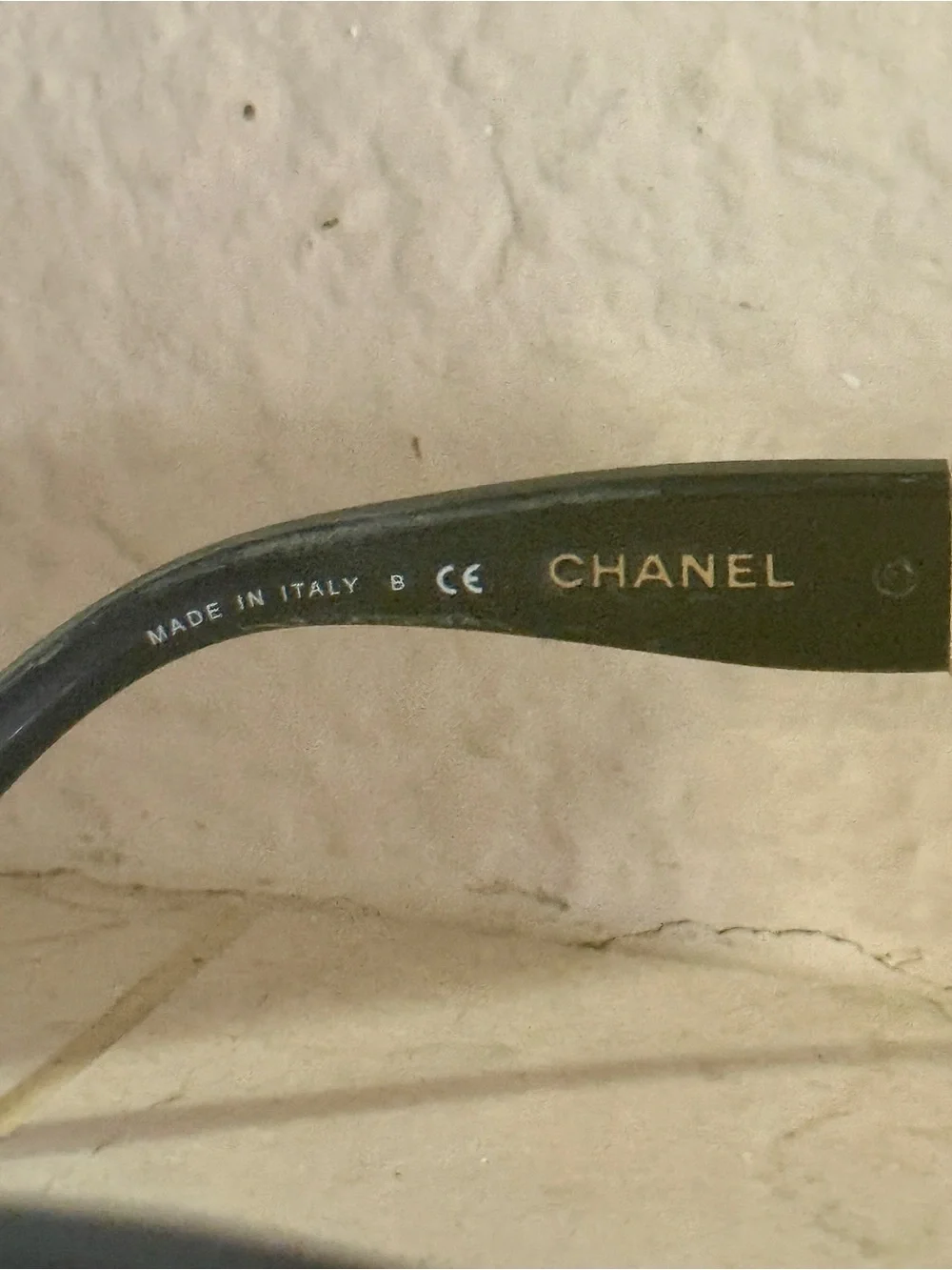 CHANEL Black Sunglasses with Gold Chain Temple Accents